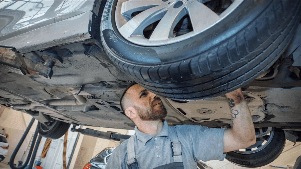 Bent rim and tire damage on a fleet van from Long Island potholes