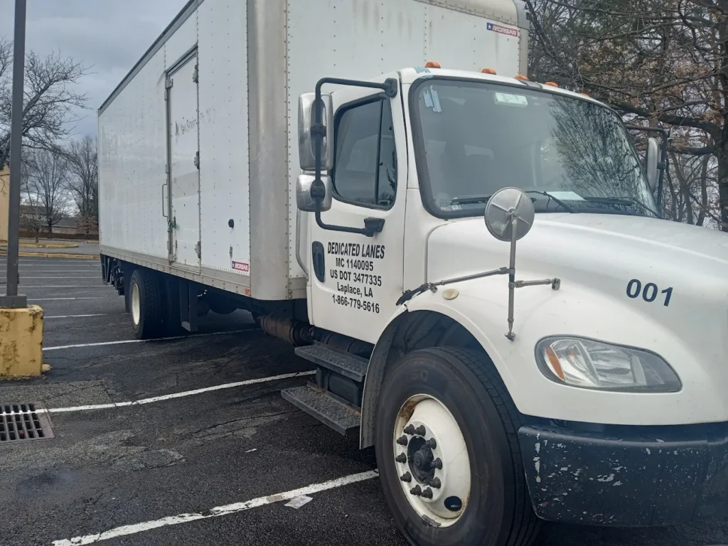 Commercial fleet vans in stop-and-go Long Island traffic that accelerates vehicle wear